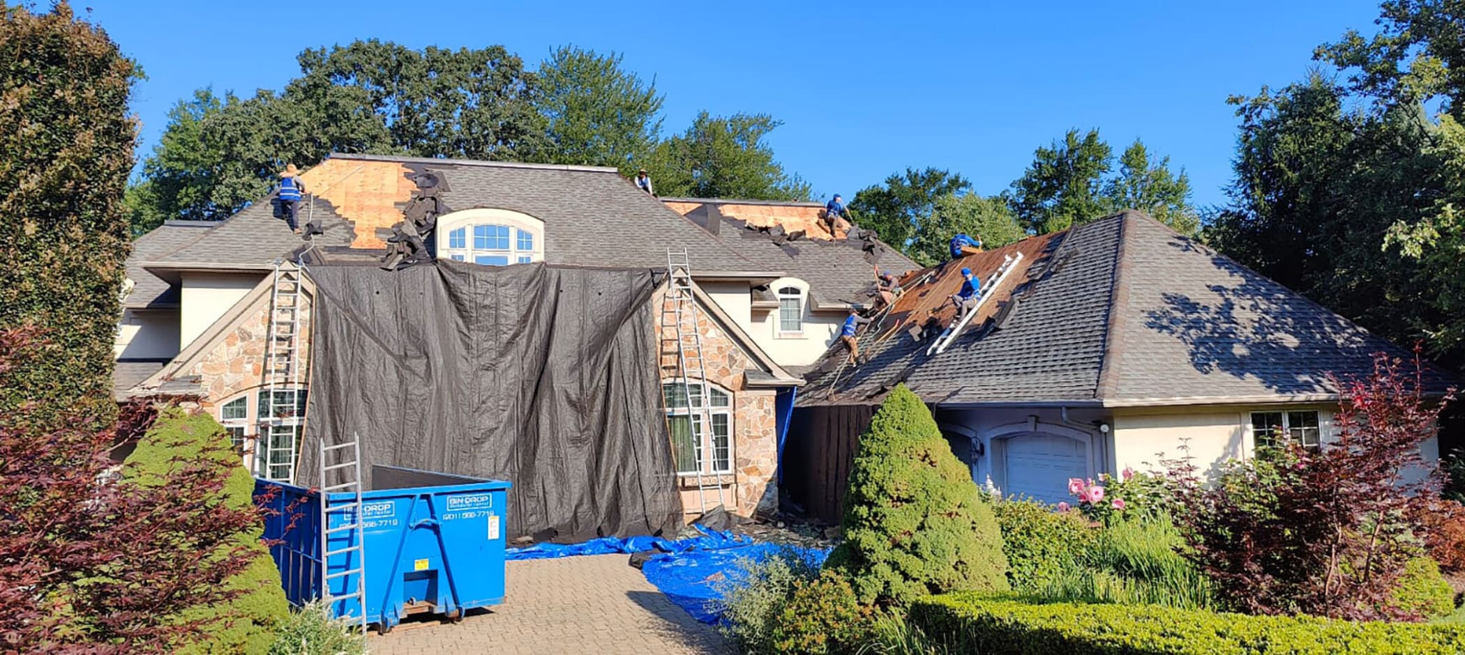 blue nail exteriors roofers